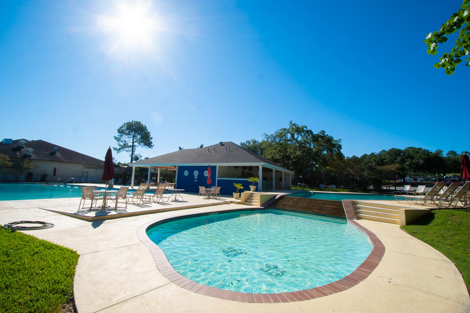 A spacious outdoor swimming pool at VRI's Sweetwater at Lake Conroe in Montgomery, TX.